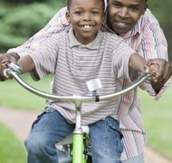 Jack Hollingsworth/Digital Vision/Getty Images Divorced parents can give their kids extras, but still must pay child support.