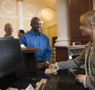 Comstock Images/Stockbyte/Getty Images Banks must obey court-ordered garnishments and levies against customer accounts.
