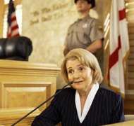 Stockbyte/Stockbyte/Getty Images It may be necessary to call character witnesses in divorces that involve custody disputes.