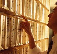 Creatas/Creatas/Getty Images Sometimes the only way to track an inheritance is manually searching files.