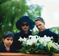 Stockbyte/Stockbyte/Getty Images A missing heir might want to show up at a relative's funeral.