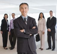 Jupiterimages/Creatas/Getty Images IRS rules determine how your officers must be compensated.