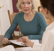 Comstock Images/Comstock/Getty Images Tell your mother you're resigning in person, if possible.