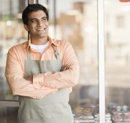 Jupiterimages/Brand X Pictures/Getty Images A simple filing is necessary before you can operate your business under its name.