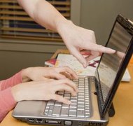 Jupiterimages/Comstock/Getty Images Filing your LLC online saves you money on fees in Wisconsin.