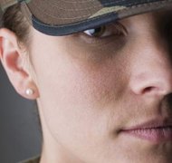 Jupiterimages/Comstock/Getty Images The federal government protects you from dealing with divorce while you’re deployed.