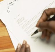 Hemera Technologies/AbleStock.com/Getty Images An estate, trust or registered charity can be named as a beneficiary.