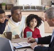 Jupiterimages/Comstock/Getty Images Consult loved ones when considering what to put in your will.