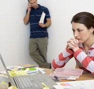 Jupiterimages/Comstock/Getty Images Divorcing couples divide marital assets and debts.