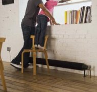 Jupiterimages/Polka Dot/Getty Images Relocation requires getting kids acclimated to their new envrionment