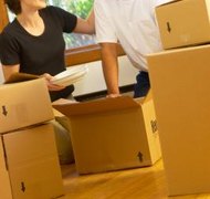 Hemera Technologies/Photos.com/Getty Images Moving in with someone new may have legal consequences.