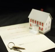 Stockbyte/Stockbyte/Getty Images In Washington, a quitclaim deed is an acceptable way to transfer title in divorce.