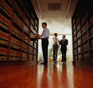 Keith Brofsky/Photodisc/Getty Images Iowa law honors wills and joint tenancies.