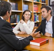 Pixland/Pixland/Getty Images Divorce negotiations do not have to create a war zone.