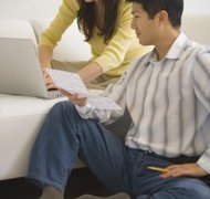 Brand X Pictures/Brand X Pictures/Getty Images Debts you had while married must still be paid after divorce.