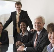Jupiterimages/Comstock/Getty Images Creating a Maine LLC may require a meeting of all the business owners and managers.