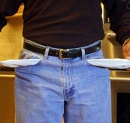 Thinkstock Images/Comstock/Getty Images Conditions such as unemployment can interfere with timely payments.