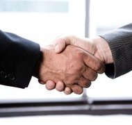 Jupiterimages/Photos.com/Getty Images The completion of a business transaction creates a sole proprietorship.