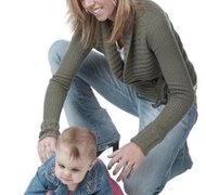 PhotoObjects.net/PhotoObjects.net/Getty Images Public assistance received by a parent or child may affect how back child support is disbursed.