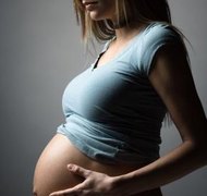 Jupiterimages/Photos.com/Getty Images Pregnancy adds complications to a divorce.