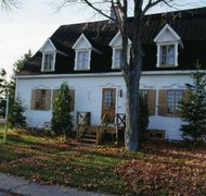 Photos.com/Photos.com/Getty Images The former marital residence can be at least partly marital property in a divorce even if it is in only one party's name.