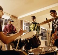Digital Vision./Digital Vision/Getty Images Bands can trademark their names as long as no one else already has the name.