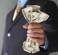 Burke/Triolo Productions/Brand X Pictures/Getty Images If your former spouse doesn't make alimony payments, you can garnish his wages.