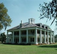 Jupiterimages/Photos.com/Getty Images Transferring land in Lousiana requires a new deed.