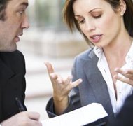 Hemera Technologies/AbleStock.com/Getty Images Dissolving a limited liability company requires the completion of paperwork.