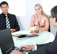Jupiterimages/Photos.com/Getty Images Setting up an LLC in Oregon may require some negotiation between the members.