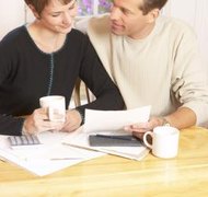 Hemera Technologies/AbleStock.com/Getty Images Some tax refund money may be protected from creditors.