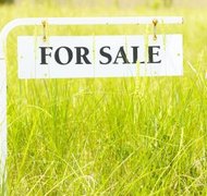 Jupiterimages/Photos.com/Getty Images Your agent can handle the entire sales process with a power of attorney.