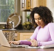 Jupiterimages/Comstock/Getty Images The executor receives a percentage of the estate's assets as compensation.