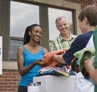 Jupiterimages/Creatas/Getty Images Your charity may benefit from a corporate structure.