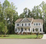 Jupiterimages/Comstock/Getty Images The deceased's home is an estate asset the executor must protect.