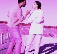 Jupiterimages/Photos.com/Getty Images When a non-citizen spouse files for divorce, it can delay her citizenship.