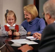 Keith Brofsky/Photodisc/Getty Images Only the trustee can access your child's inheritance.