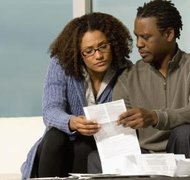 Jupiterimages/Comstock/Getty Images When debt gets overwhelming, filing for bankruptcy can help you recover.