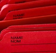 Jupiterimages/Photos.com/Getty Images You cannot complete you name change request electronically.