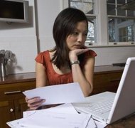 Comstock Images/Comstock/Getty Images The executor is reponsible for numerous administrative tasks.