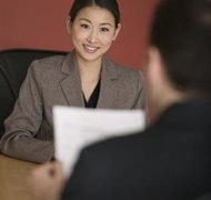 Comstock Images/Comstock/Getty Images You may need to disclose any name changes for a background check.
