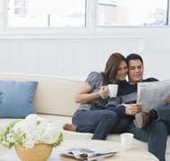 Jupiterimages/Comstock/Getty Images Cohabitation may or may not affect your Illinois divorce, depending on who you're living with.