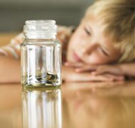 Flying Colours Ltd/Photodisc/Getty Images Debts owed for child support cannot be discharged in bankruptcy.
