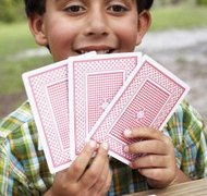 Jenny Acheson/Lifesize/Getty Images Copyright can protect the text and images in a card game.