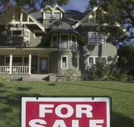 Brand X Pictures/Brand X Pictures/Getty Images Inherited property may be sold to a third party or one of the other heirs.