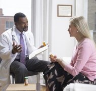 Digital Vision./Digital Vision/Getty Images New Hampshire state laws help divorced spouses maintain insurance coverage.