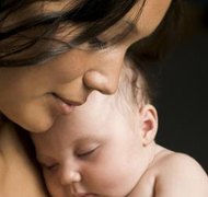 Digital Vision/Digital Vision/Getty Images You can give your newborn the surname of your choice.
