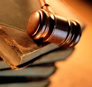Photodisc/Photodisc/Getty Images The judge's signature on the Final Judgment finalizes a dissolution of marriage.