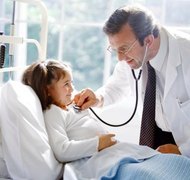 George Doyle/Stockbyte/Getty Images Both parents usually contribute to the children's medical bills.