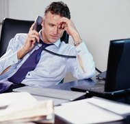 Digital Vision/Photodisc/Getty Images If you work long hours, this may affect custody.